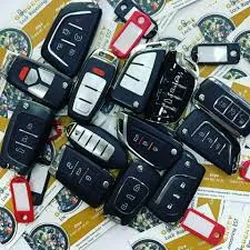 Assorted car key remotes and transponder keys available at Golden Key Lock Repairing EST Dubai